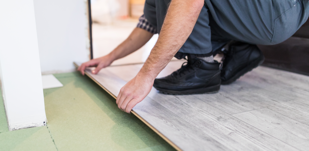 a man installing vinyl